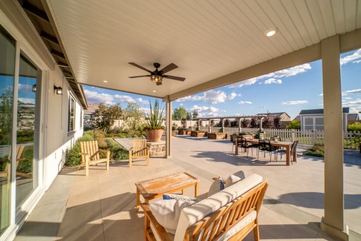Large aluminum patio cover with ceiling fan