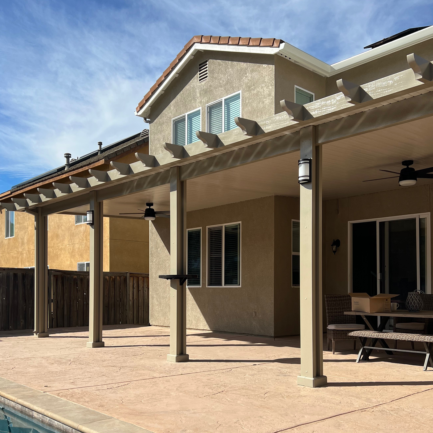 Large attached patio cover with AlumaBase and one AlumaTable installed