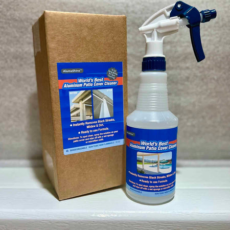 Spray bottle of Alumashine patio cover cleaner next to a box that contains the same product