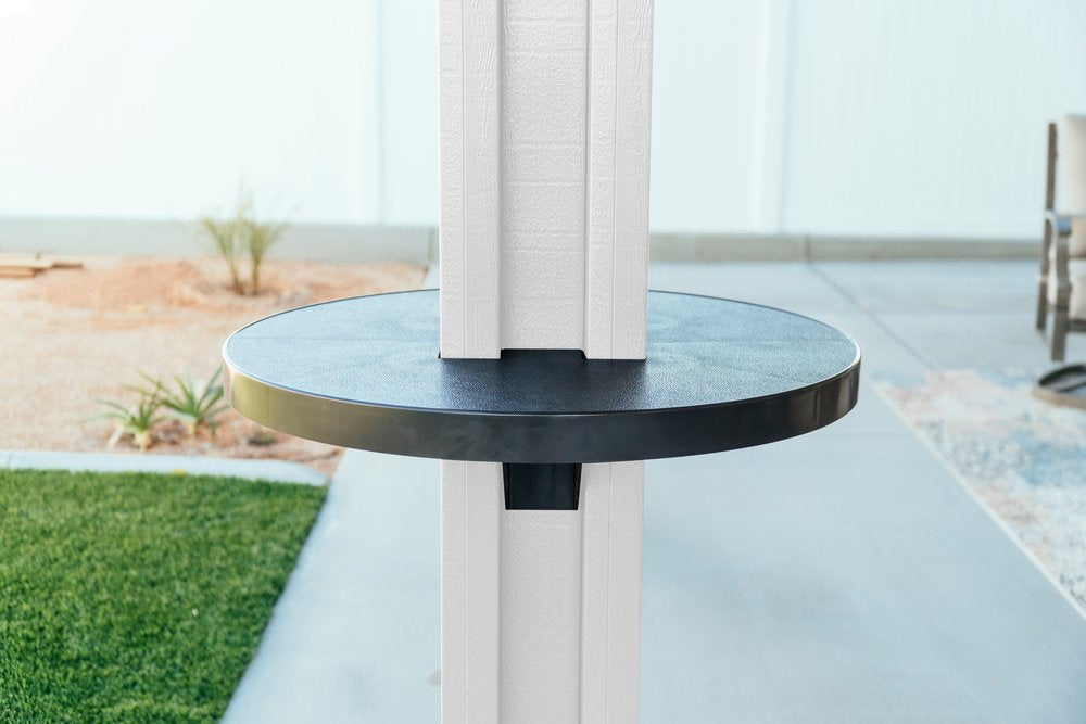 Black Alumatable installed on a white patio cover post