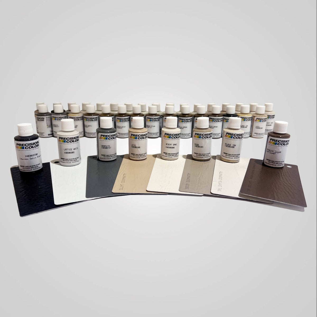 Alumawood paint samples laid out on top of color swatches