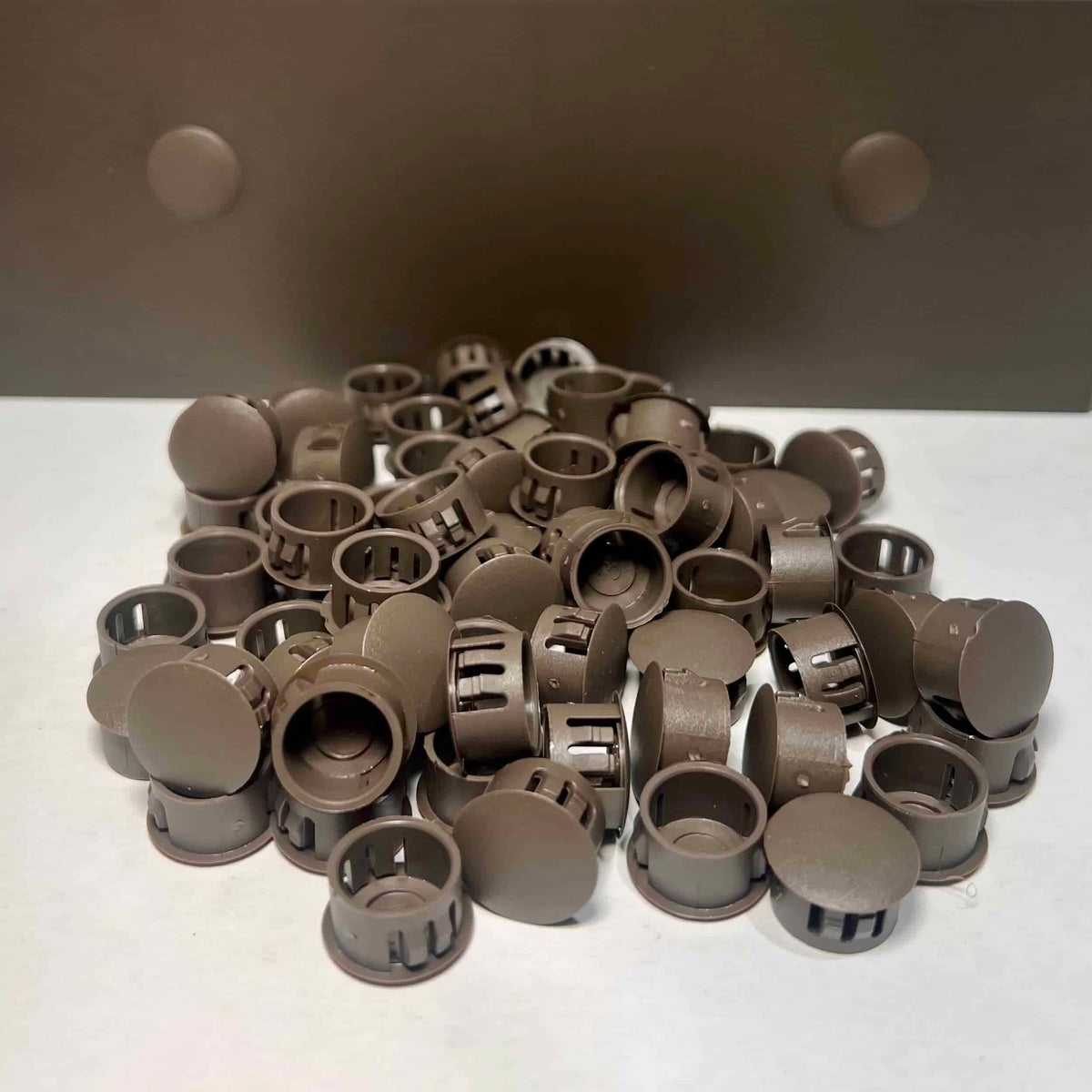 Spanish brown patio cover hole plugs in a pile