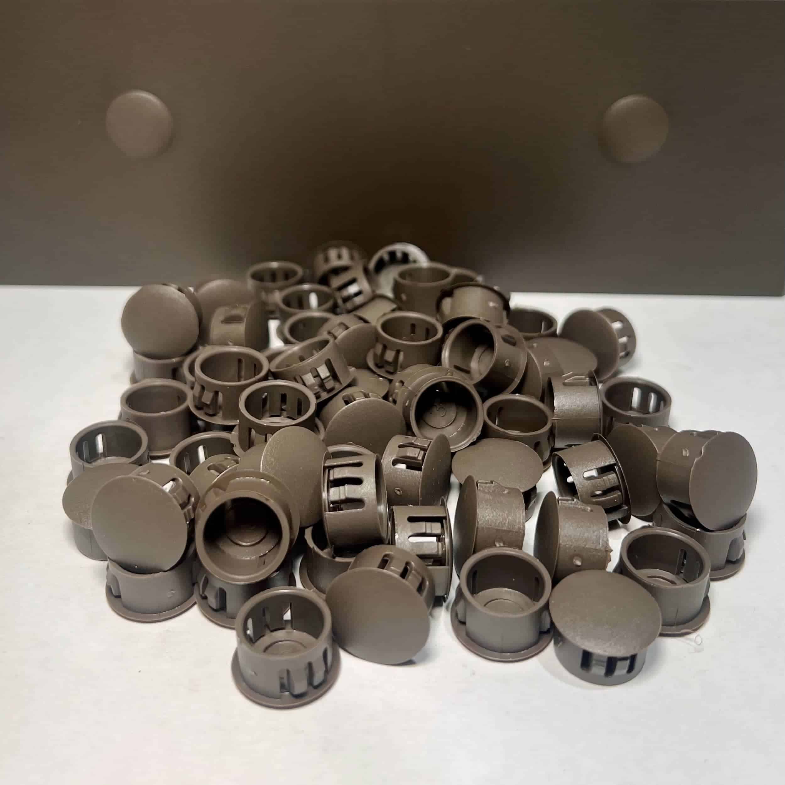 Spanish brown patio cover hole plugs in a pile