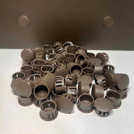 Spanish brown patio cover hole plugs in a pile