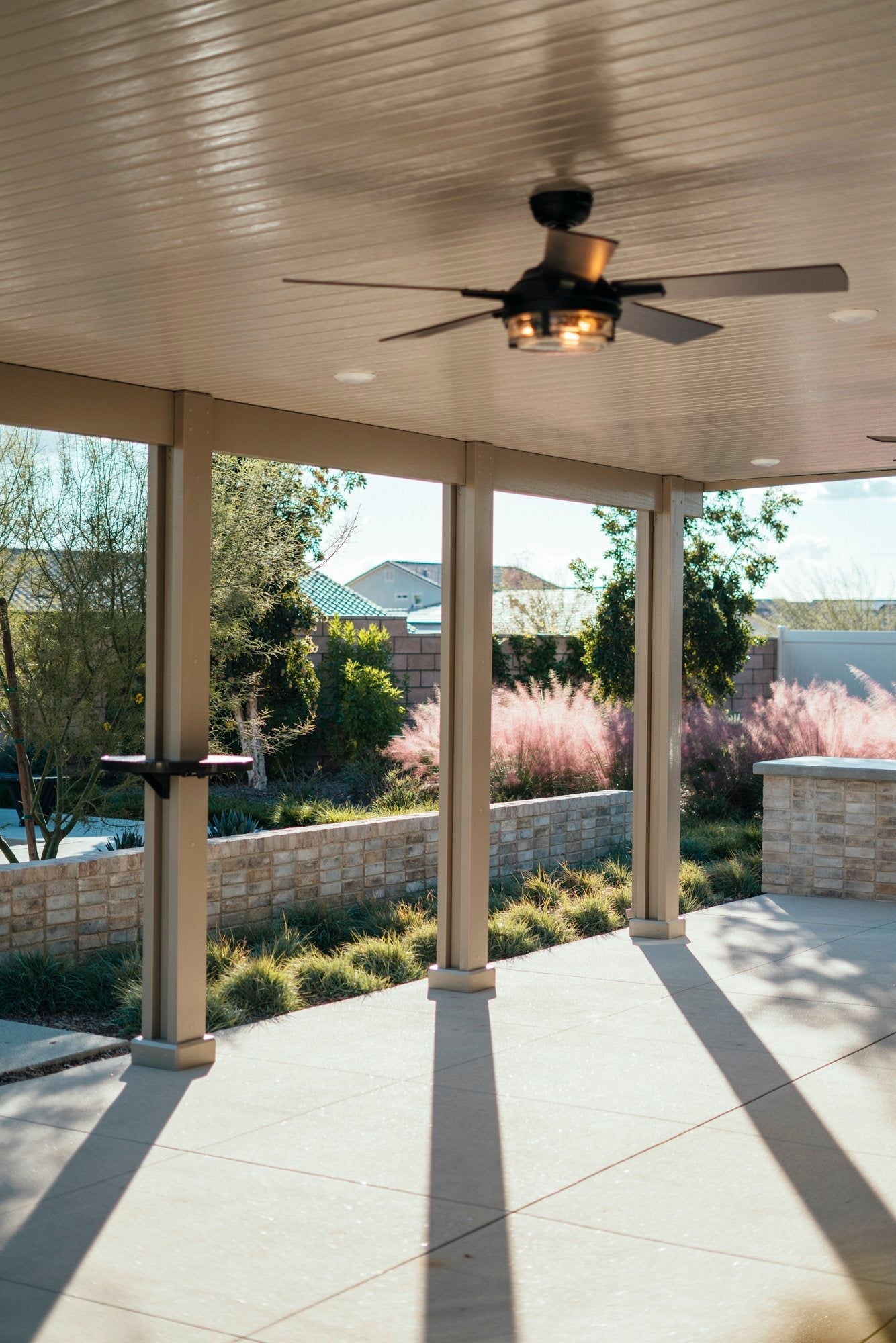 Patio cover with ceiling fan, AlumaBase, and AlumaTable installed